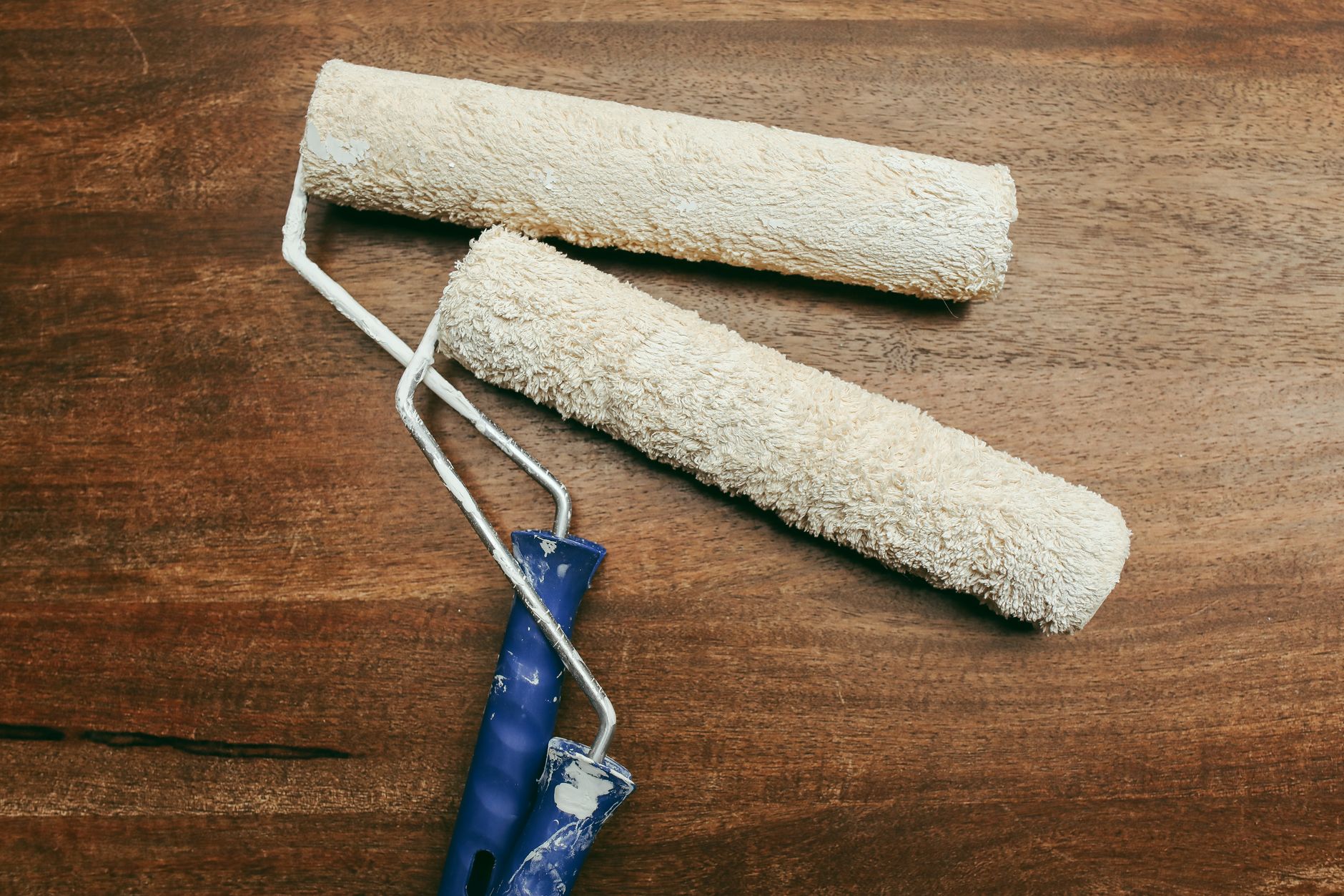 Thin coats, with the grain, and never let it puddle.