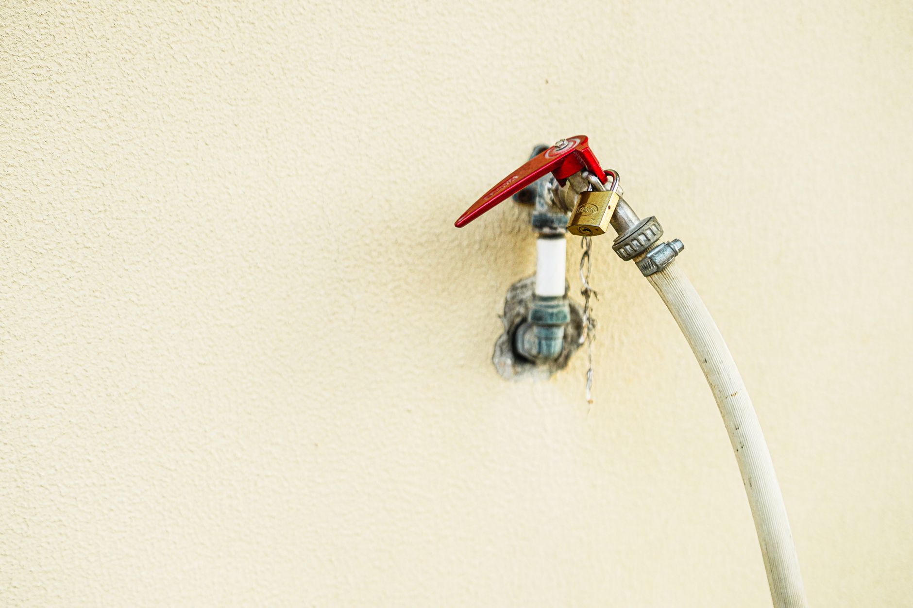 A frost-free outdoor faucet on house siding