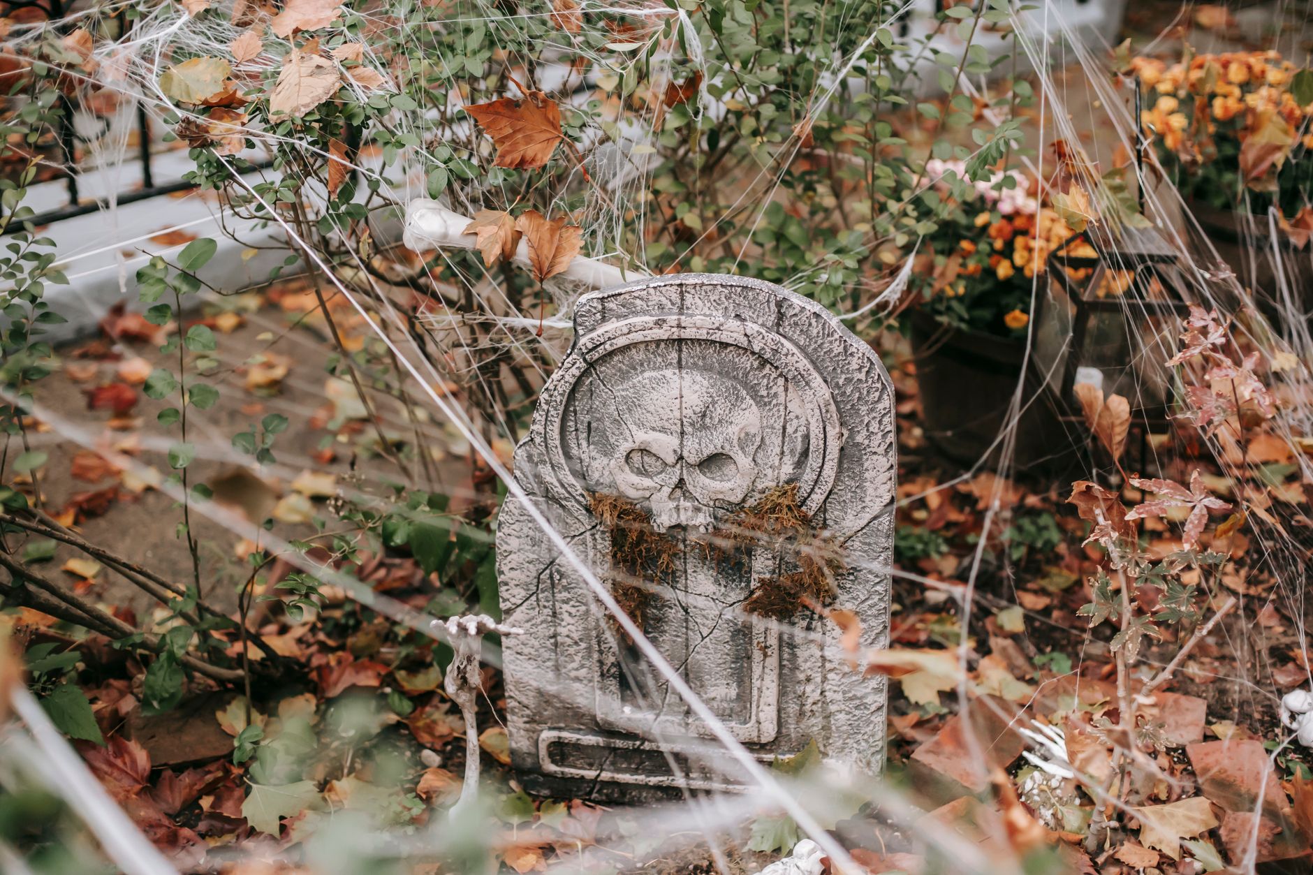 Gravestones, webbing and props staged on a lawn