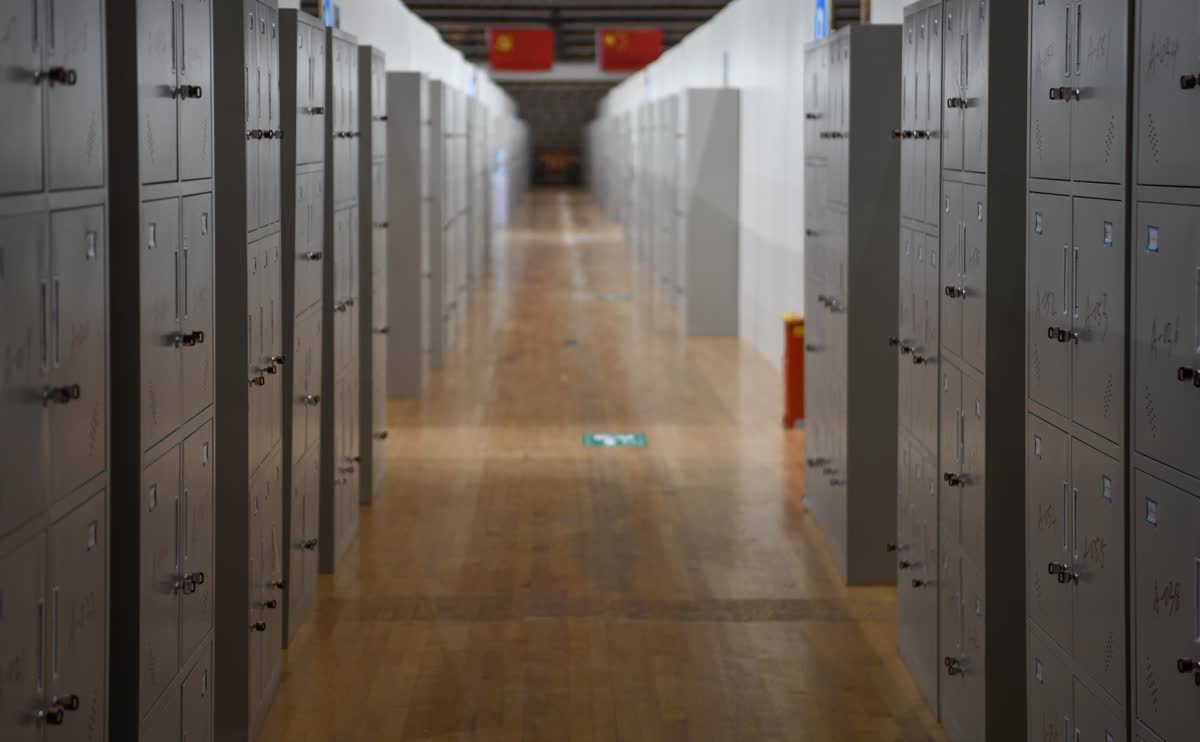 A row of school lockers in a hallway