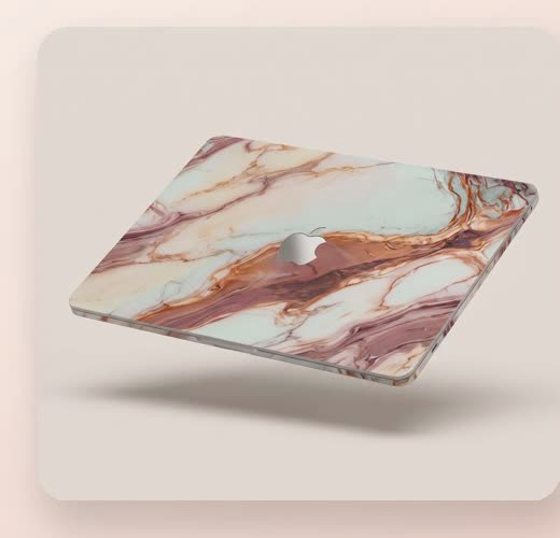 A WRAPT vinyl skin on a MacBook